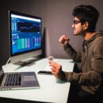 indian trader with bitcoin checking stock trading data analysis concept working office with financial graph computer monitors 231208 3652 | Cryptocurrency | Cryptocurrency